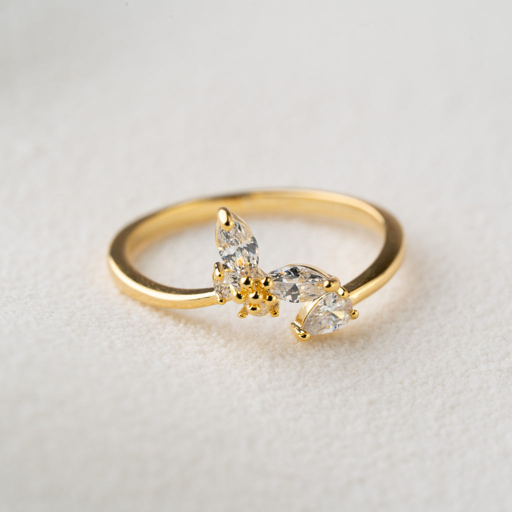 Minimal Floral Spark Ring with Crystal Petals
