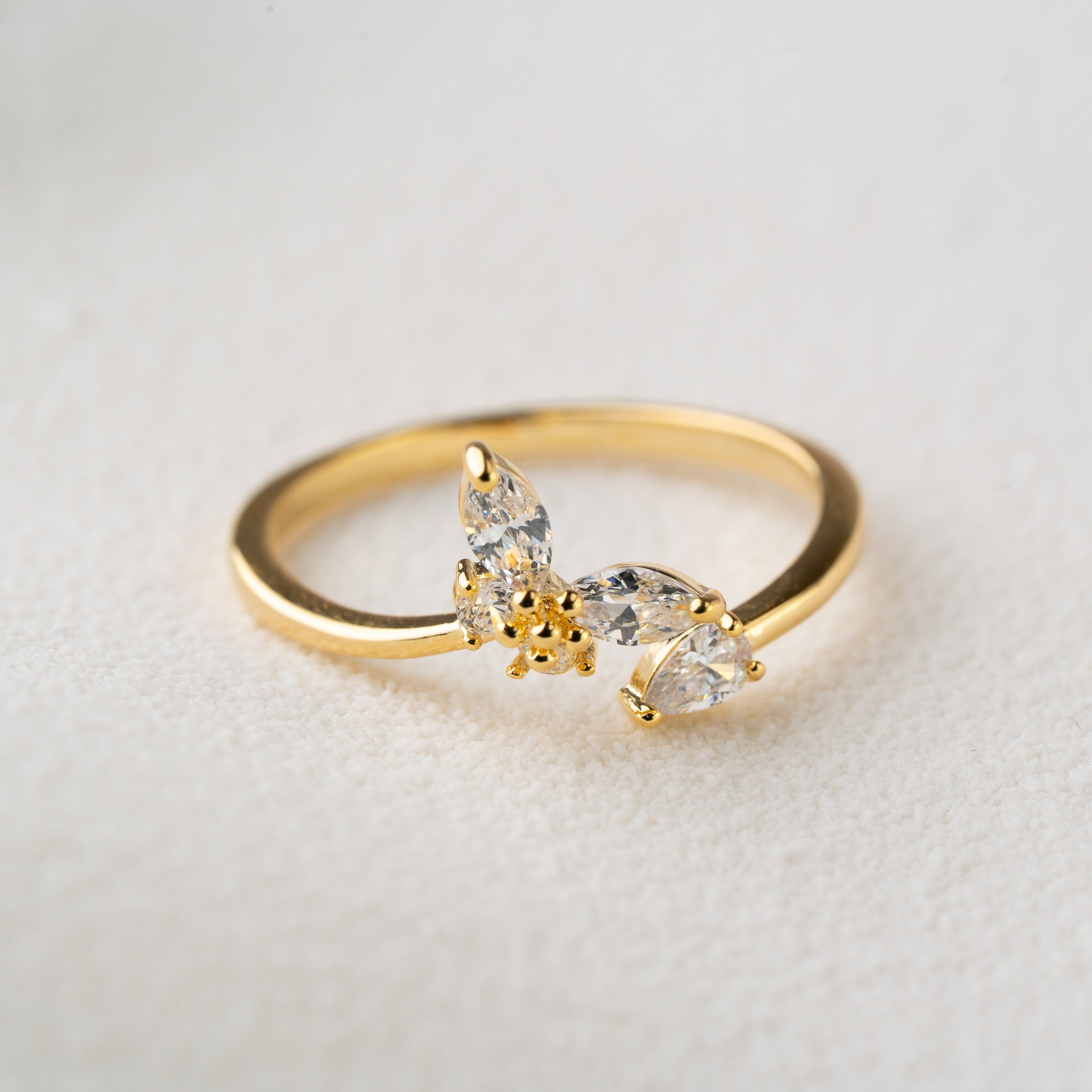 Minimal Floral Spark Ring with Crystal Petals