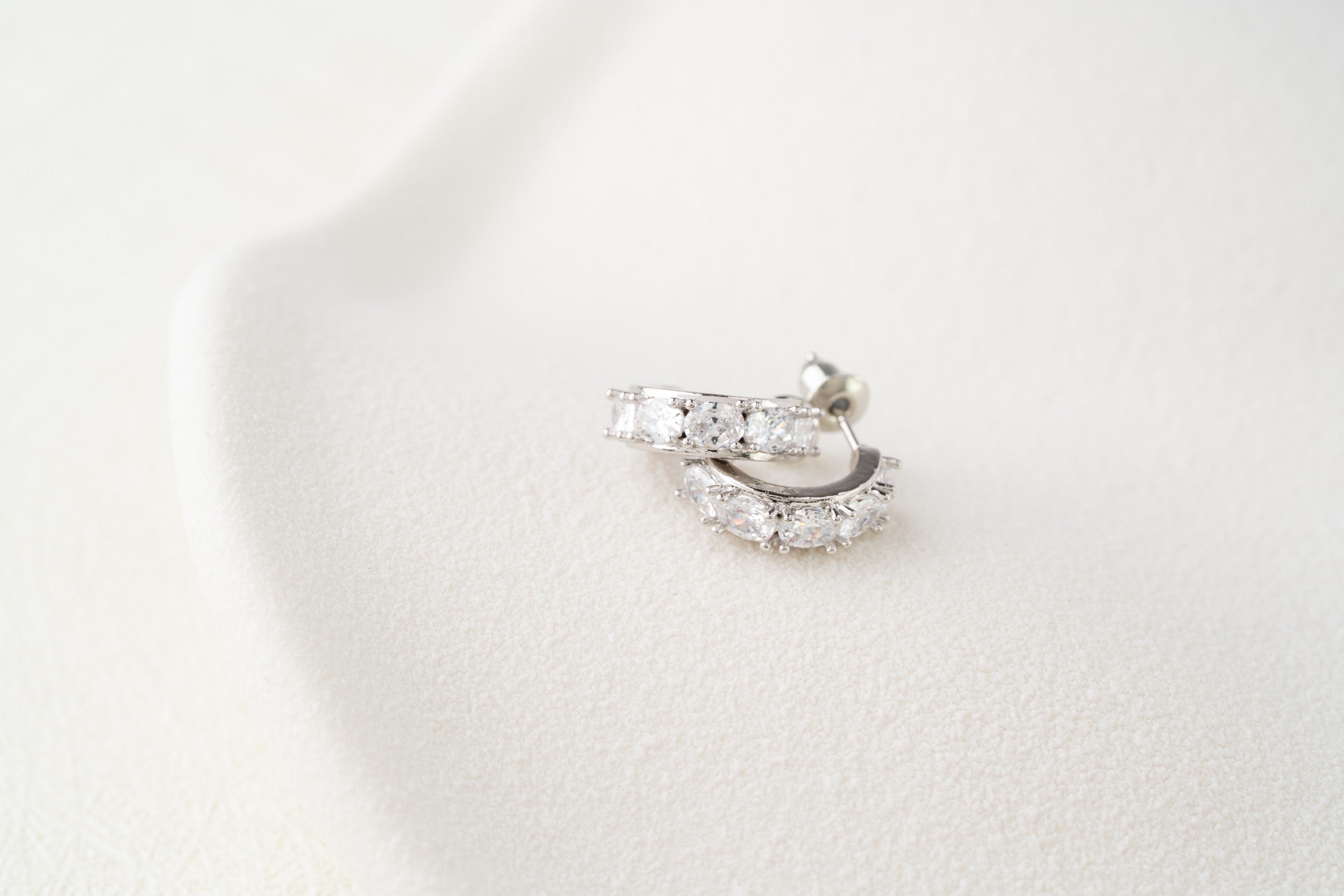 Radiant Curve Crystal Stud Hoops