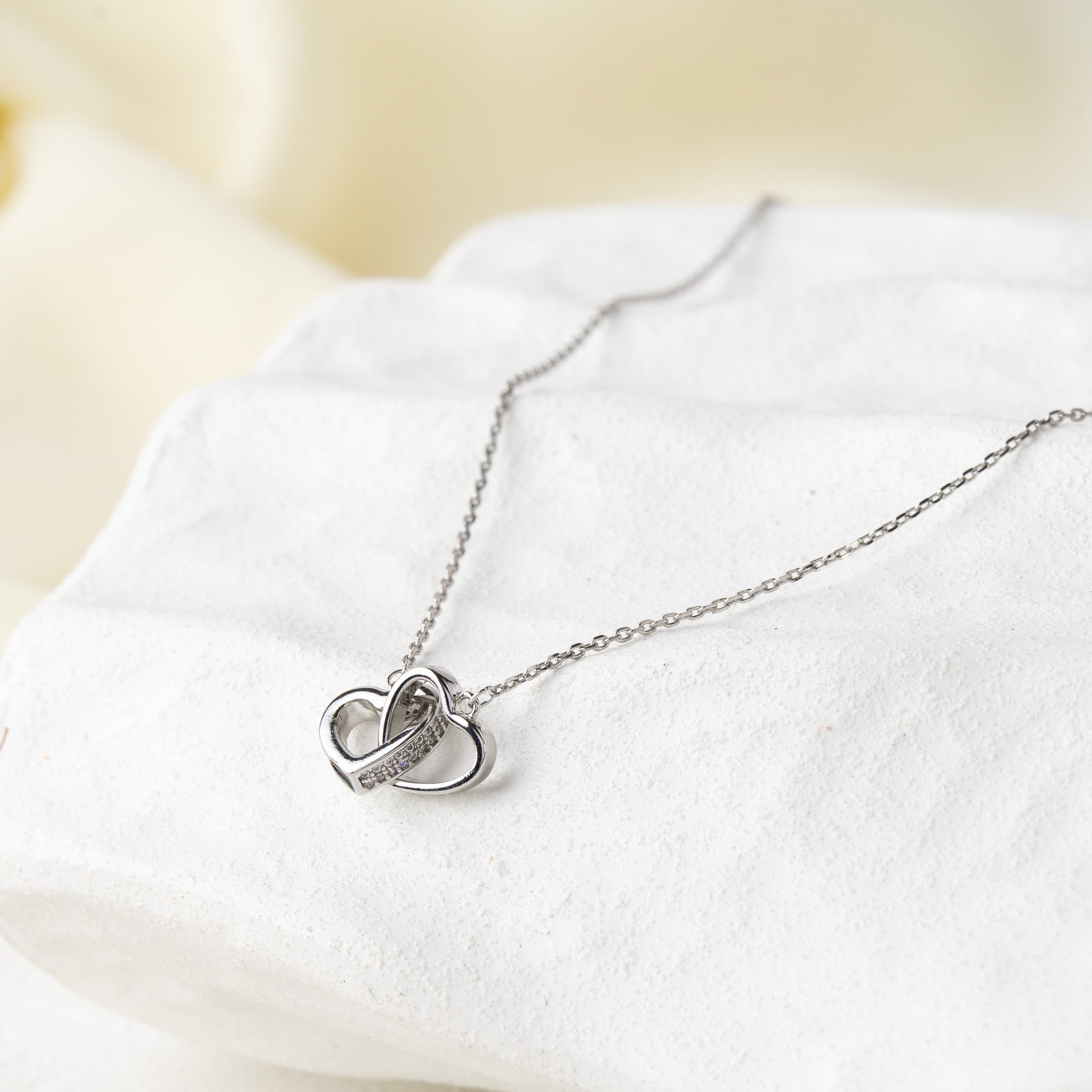 Interlocking Heart Pendant Necklace with Crystal Band