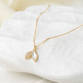Dual Leaf Pendant Necklace with Crystal & Pearl Accent
