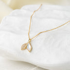 Dual Leaf Pendant Necklace with Crystal & Pearl Accent